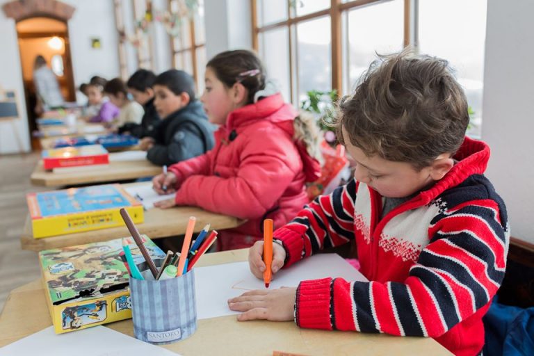Romanian lawmakers vote to force government to honor child allowance increase bill