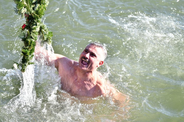 Epiphany: Orthodox believers retrieve crosses from icy rivers,  pope says ‘reject God of money’ and serve others