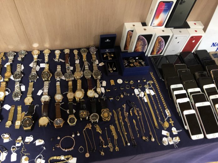 Jewlery, watches, phones stolen by pickpocketing ring. Credit: Policia Nacional