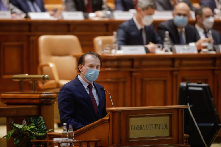 Romanian Parliament approves former banker as new prime minister to head pro-European coalition government