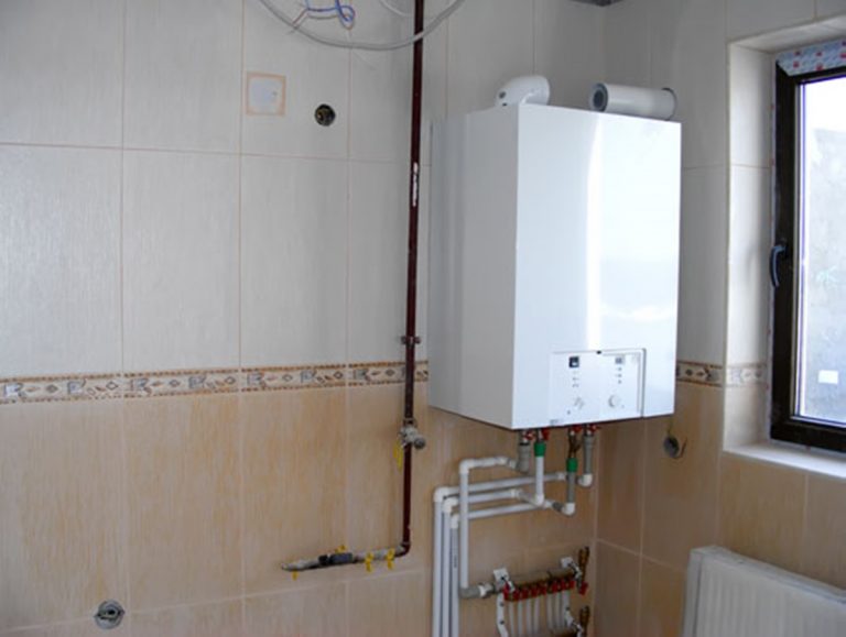 Centralele termice de apartament, interzise dacă au coșuri individuale. Soluţia pentru a le putea monta în continuare