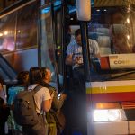 Ukrainians getting on a bus in Bucharest Photos: Dan Cretu