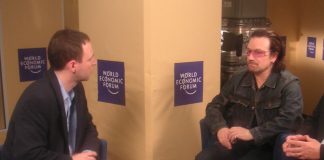Author Dan Perry with Bono of U2 at Davos.