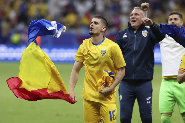 Beaten but not bowed: Romanian fans salute their team after 3-0 defeat against the Netherlands in EURO 2024