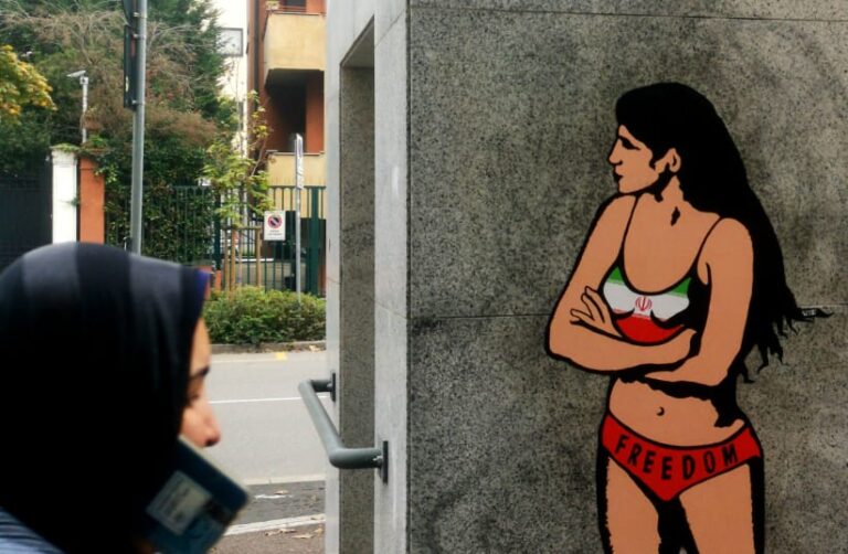 Iran’s protest girl painted on Iranian Embassy in Milan
