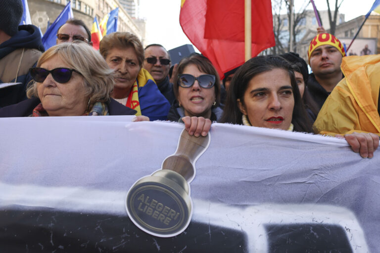 Protesters attack video journalist, urinate on TV car in Romania as tensions rise