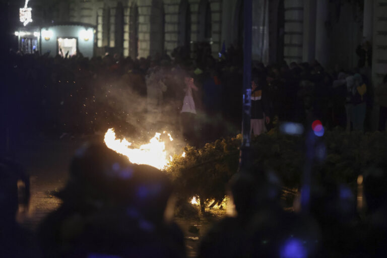 PHOTOS | 13 police officers injured in clashes with supporters of pro-Russia presidential candidate