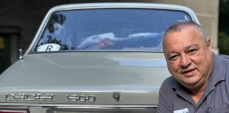 License plate collector Cristian Luca in Bucharest. By Larry Luxner