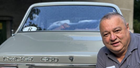 License plate collector Cristian Luca in Bucharest. By Larry Luxner