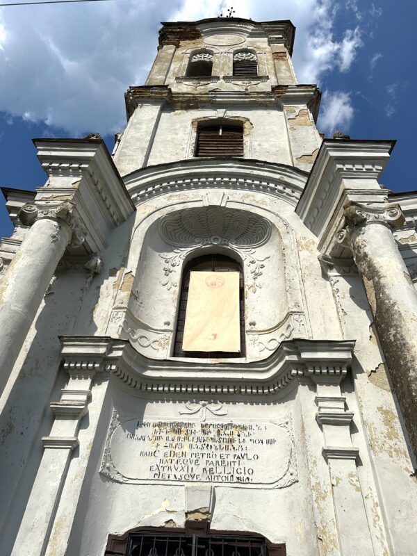 Church of the former Mechitarist monastery (a separate building from the monastery) in Dumbrăveni, Romania, has an inscription in Latin and Armenian (photo Larry Luxner)