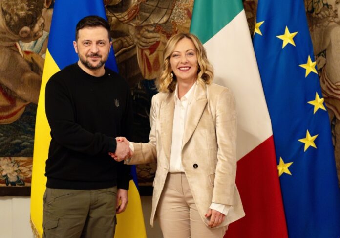 Giorgia Meloni shakes hands with Zelensky to support Ukraine throughout 2026